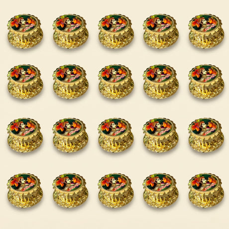 Golden ornate circular radha krishna haldi kumkum holder with vibrant red orange floral designs for pooja and weddings