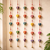 Colorful rajasthani heart-shaped door hanging wind chimes with gold detailing and small bells for diwali and wedding decor