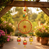 A vibrant handcrafted rajasthani ring elephant wall hanging with gold elephant and colorful bells for home decor