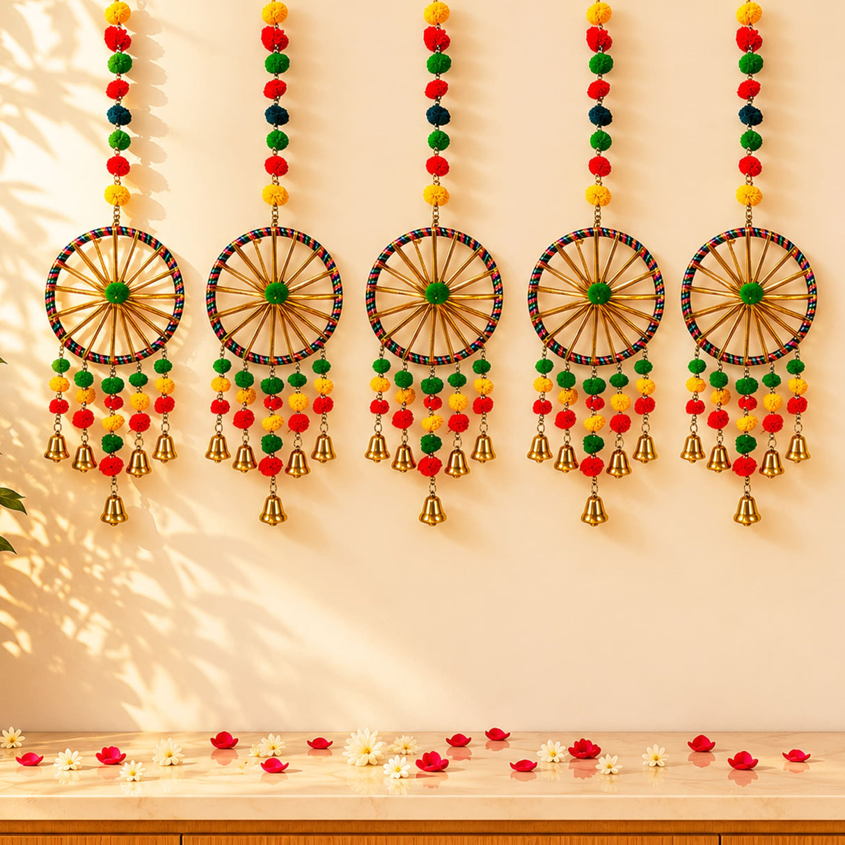 Ring wall hanging with colorful pom-poms and bells on woven circular frames handcrafted for home and office decor