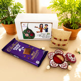 Rakhi gift hamper for brother and bhabhi featuring purple cadbury dairy milk chocolate bar and designer raksha bracelets
