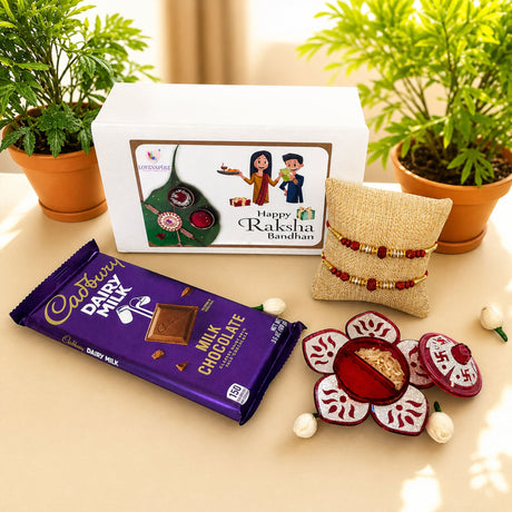 Rakhi gift hamper for brother and bhabhi featuring purple cadbury dairy milk chocolate bar and designer raksha bracelets