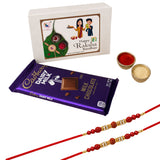 Purple cadbury dairy milk chocolate bar with gold foil lettering included in rakhi gift hamper set for brother and bhabhi