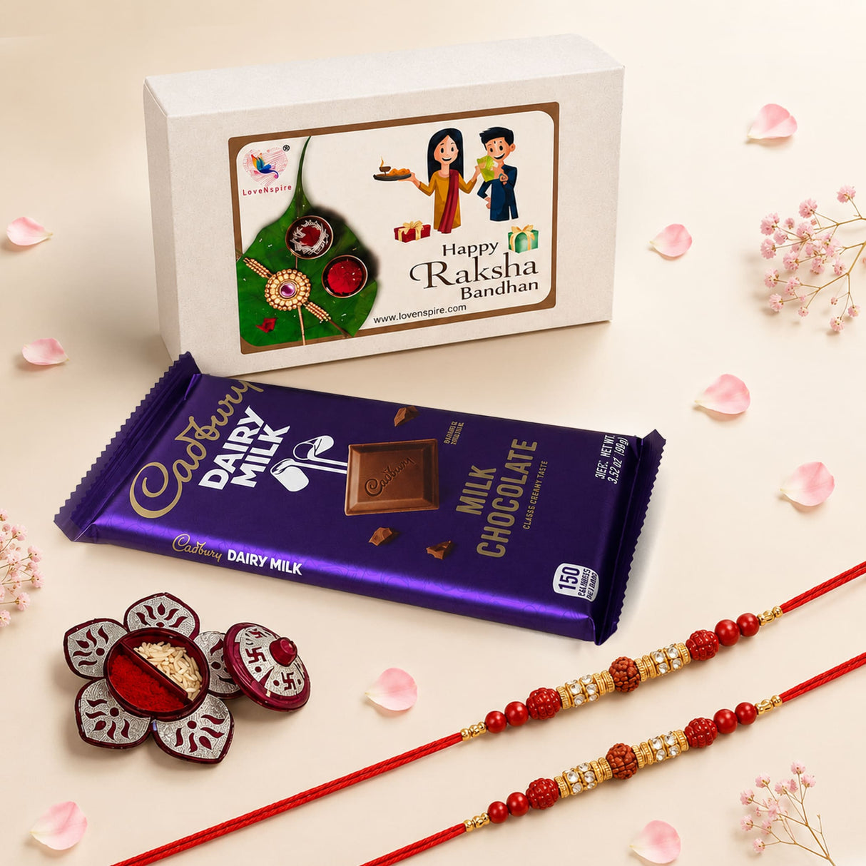Purple cadbury dairy milk chocolate bar with gold foil and square piece in rakhi gift hamper set for brother and bhabhi