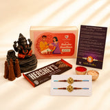 Raksha Bandhan Gift Hamper for Brother & Bhabhi - Includes Adjustable Rakhi Bracelet Set, Ganesha Dhoop Burner, Roli Chawal & Chocolate