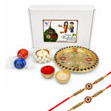 Gold-plated meenakari pooja plate with intricate floral patterns and colorful enamel accents in rakhi gift hamper