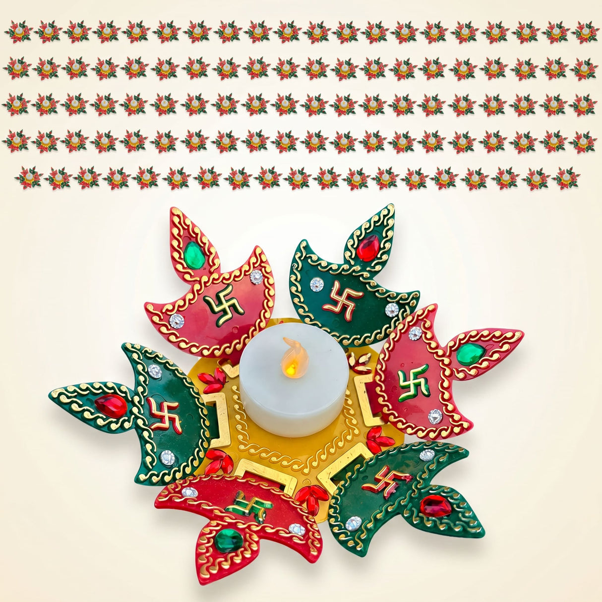 Colorful rangoli diya set with red and green ceramic petals adorned with swastika symbols and gemstones for diwali decor