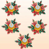 Colorful rangoli diya set with red green gold accents and intricate swastika patterns for diwali decor and gifts