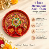 Decorative 6-inch metal pooja thali in red meenakari with gold green floral patterns and two fixed bowls for aarti rituals