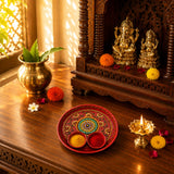 Red ornate 6 inch rhinestone pooja aarti thali with meenakari work holding two bowls of haldi and kumkum powders