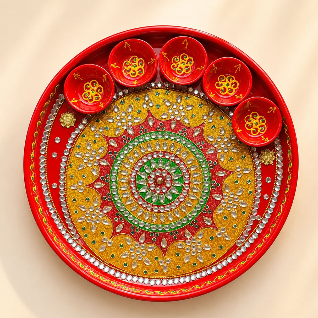 Pooja thali with 5 diya bowls featuring vibrant red and gold handmade design with silver rhinestone embellishments for rituals