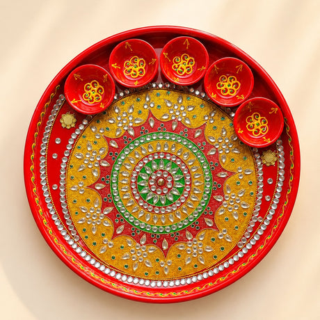 Pooja thali with 5 diya bowls featuring vibrant red and gold handmade design with silver rhinestone embellishments for rituals