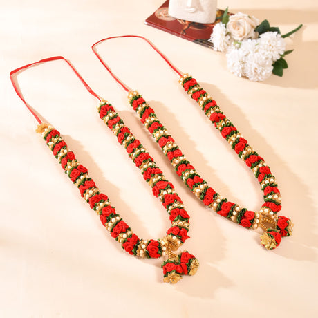 Red green velvet varmala garland with pearl accents, gold tassels