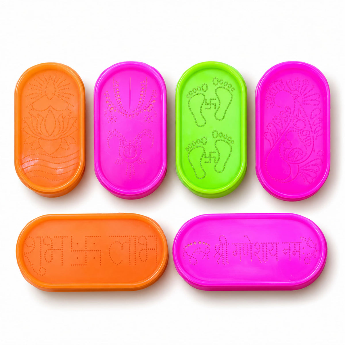 Brightly colored orange pink and green plastic rangoli stencil kit with lotus hands footprints swastikas and sanskrit designs for diwali and puja decor