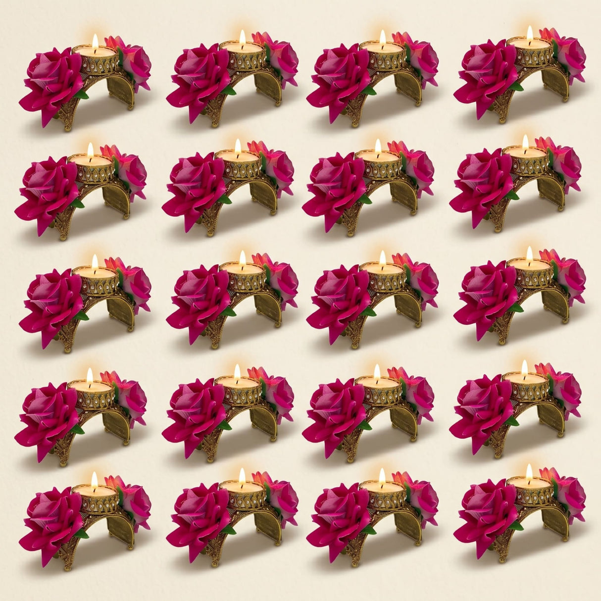 Gold-toned rose diwali candle holders with intricate detailing and vibrant magenta artificial roses for festive decor