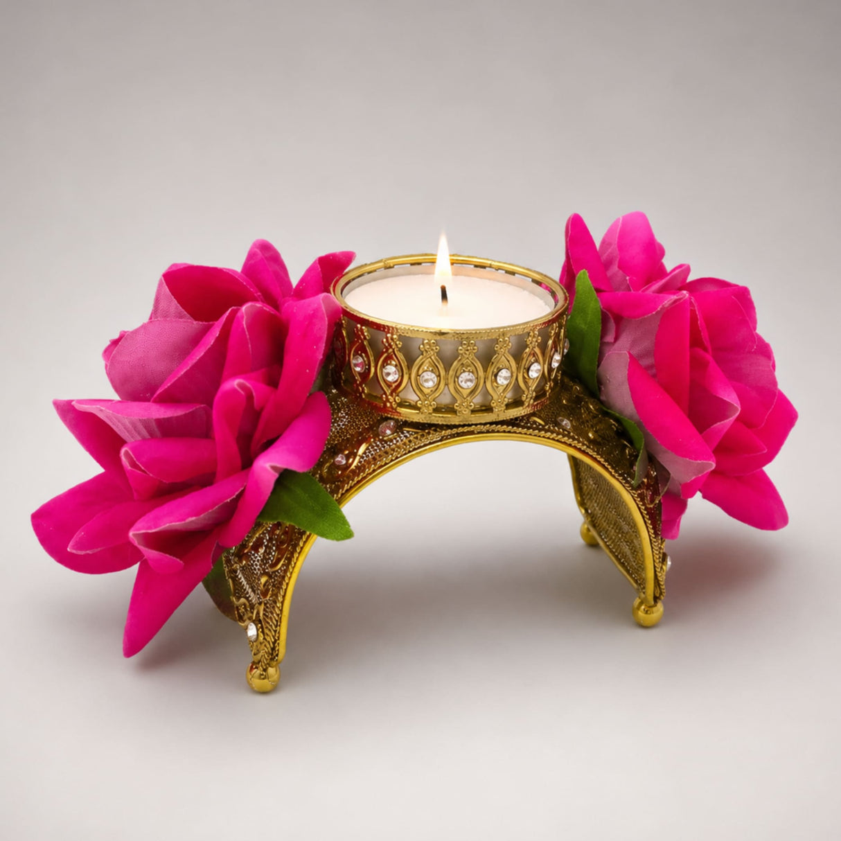 Gold ornate rose Diwali candle holder with pink artificial flowers for Diwali decor and festive gifts
