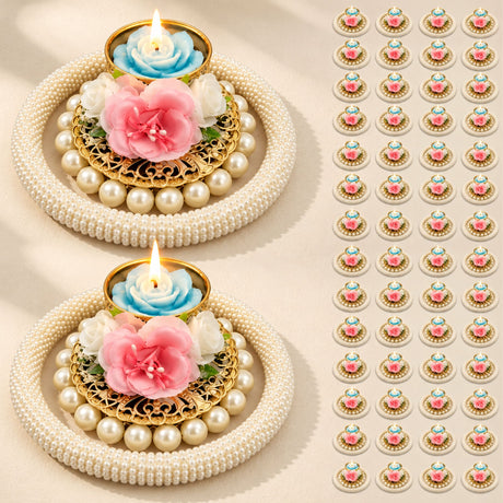 Elegant gold-toned rose pearl tea light candle holders with faux pearls and blue rose candles for festive home decor