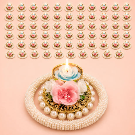 A delicate gold-toned rose pearl tealight candle holder with pink white artificial flower and pearls for festive decor