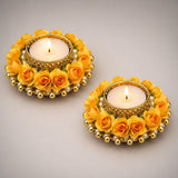 Golden floral tealight candle holders adorned with yellow roses and pearls for festival of light decor and gifts