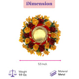 Gold-colored metal diya adorned with red and yellow paper roses for festive rangoli candle holder decor