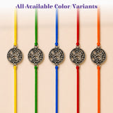 Silver-toned circular floral charm with intricate patterns on colorful braided cords for raksha bandhan gift set