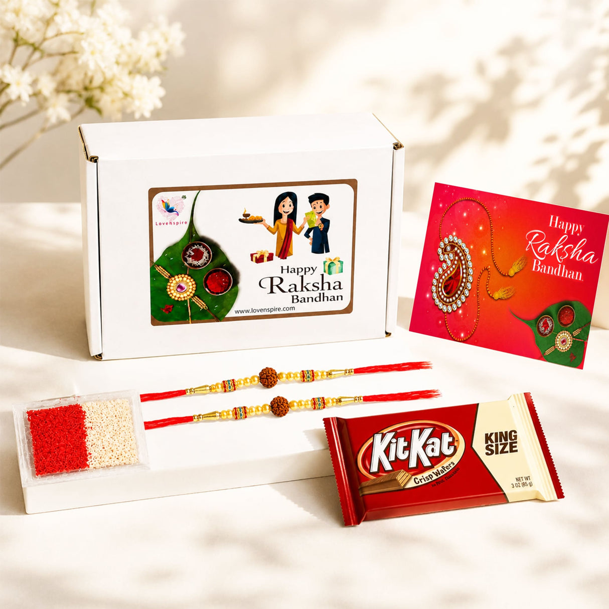 Red and gold rakhi with intricate beadwork in traditional handmade rudraksha bead bracelet for raksha bandhan gift hamper