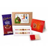 Cadbury Dairy Milk fruit and nut chocolate bar in purple and red wrapper included in Raksha Bandhan gift hamper for brother and bhabhi