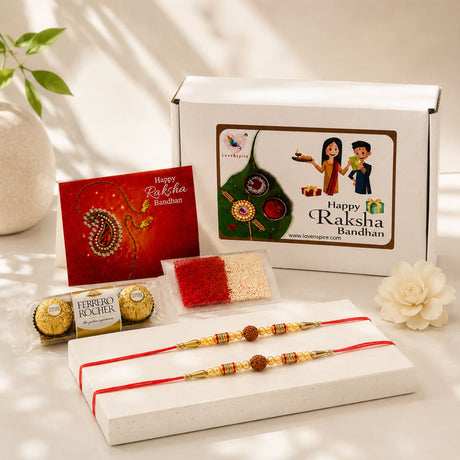 Red and gold traditional handmade rudraksha bead rakhi with intricate beadwork and wooden pendant for brother and bhabhi