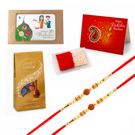 Gold-colored lindt lindor assorted chocolate truffles in foil packaging included in raksha bandhan gift hamper for brother and bhabhi