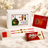 Red and gold traditional handmade rudraksha bead rakhi bracelet with central wooden bead for brother and bhabhi gift hamper
