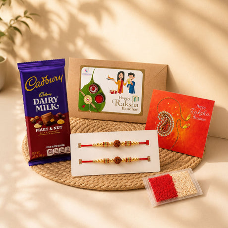 A vibrant red and gold handmade rudraksha bead rakhi with intricate beadwork in a festive gift box for Raksha Bandhan