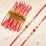 Red cord rudraksha rakhi with golden beads and brown rudraksha seeds handmade for bhaiya bhabhi protection and blessings