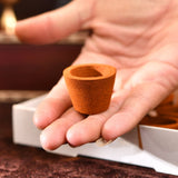 Terracotta Saffron Sandalwood Dhoop burner with porous texture