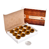 Brown sandalwood incense cones in ornate white box packaging