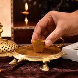 Golden brass incense burner with ornate three-legged feet for Sandalwood Dhoop Cups