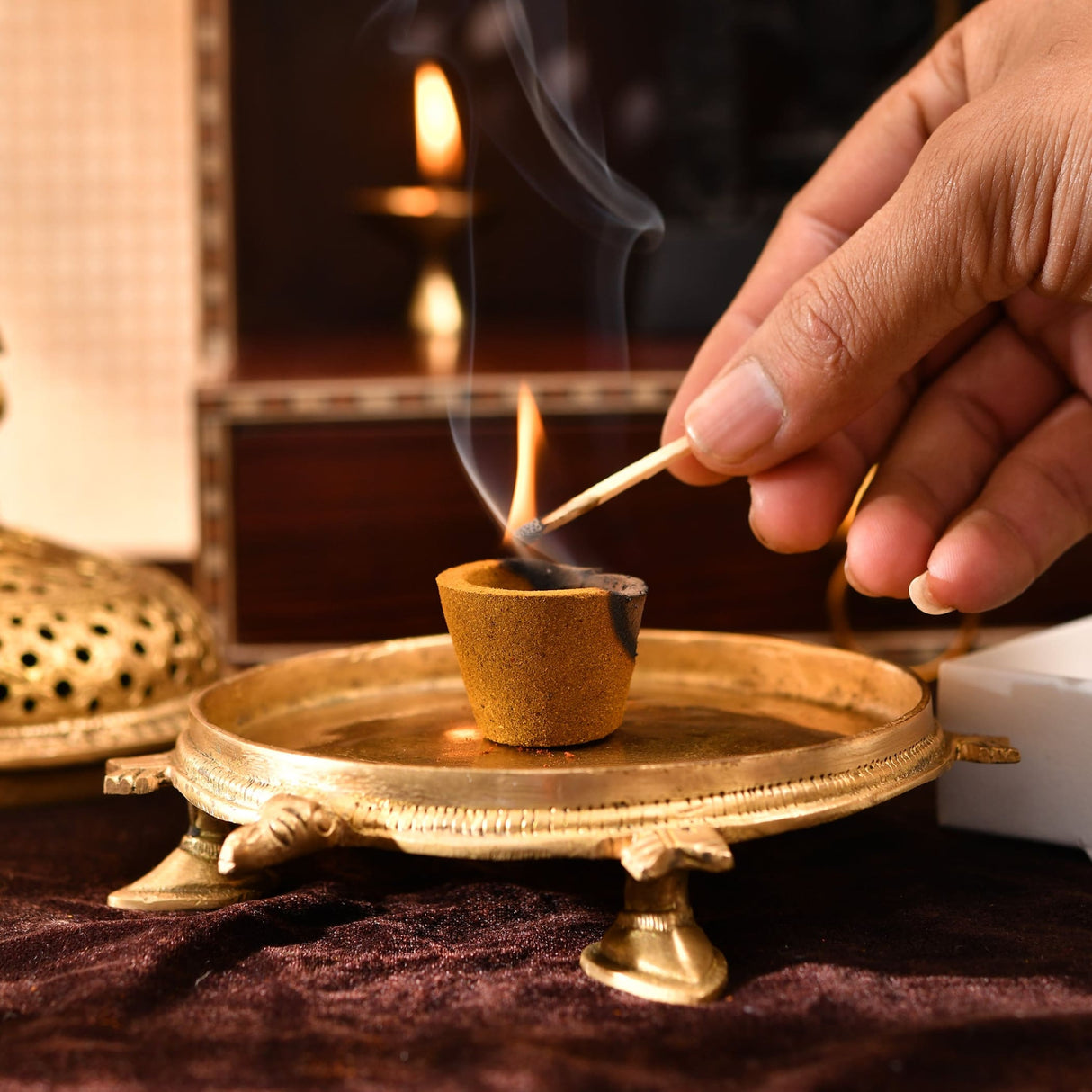 Golden incense burner with Sandalwood Dhoop Cups on ornate brass tray