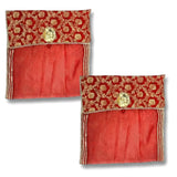 Red and gold embroidered fabric saree covers with button closure for storage and wardrobe organization