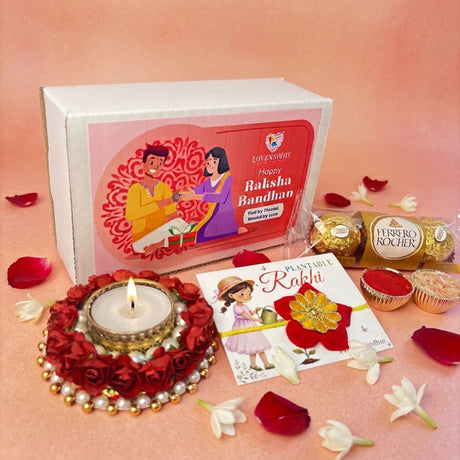 Red rose-adorned rose tealight candle holder with gold accents and pearl trim from flower shaped seed rakhi gift hamper for brother