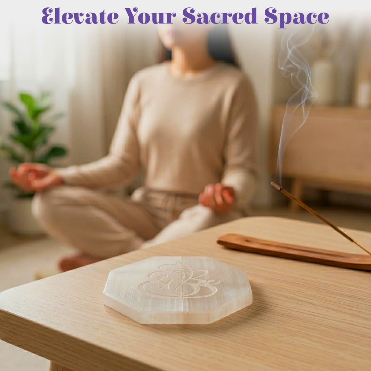 Hexagonal white selenite crystal coaster with engraved flower of life and chakra design for healing stones charging plate