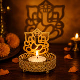 Golden ornate shadow Ganesha tea light candle holder with intricate design and delicate lattice base for home decor