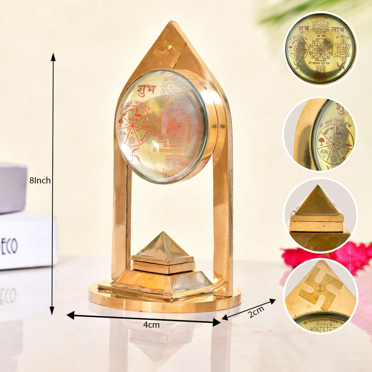 Vastu pillar pyramid and shri yantra with magnifying glass