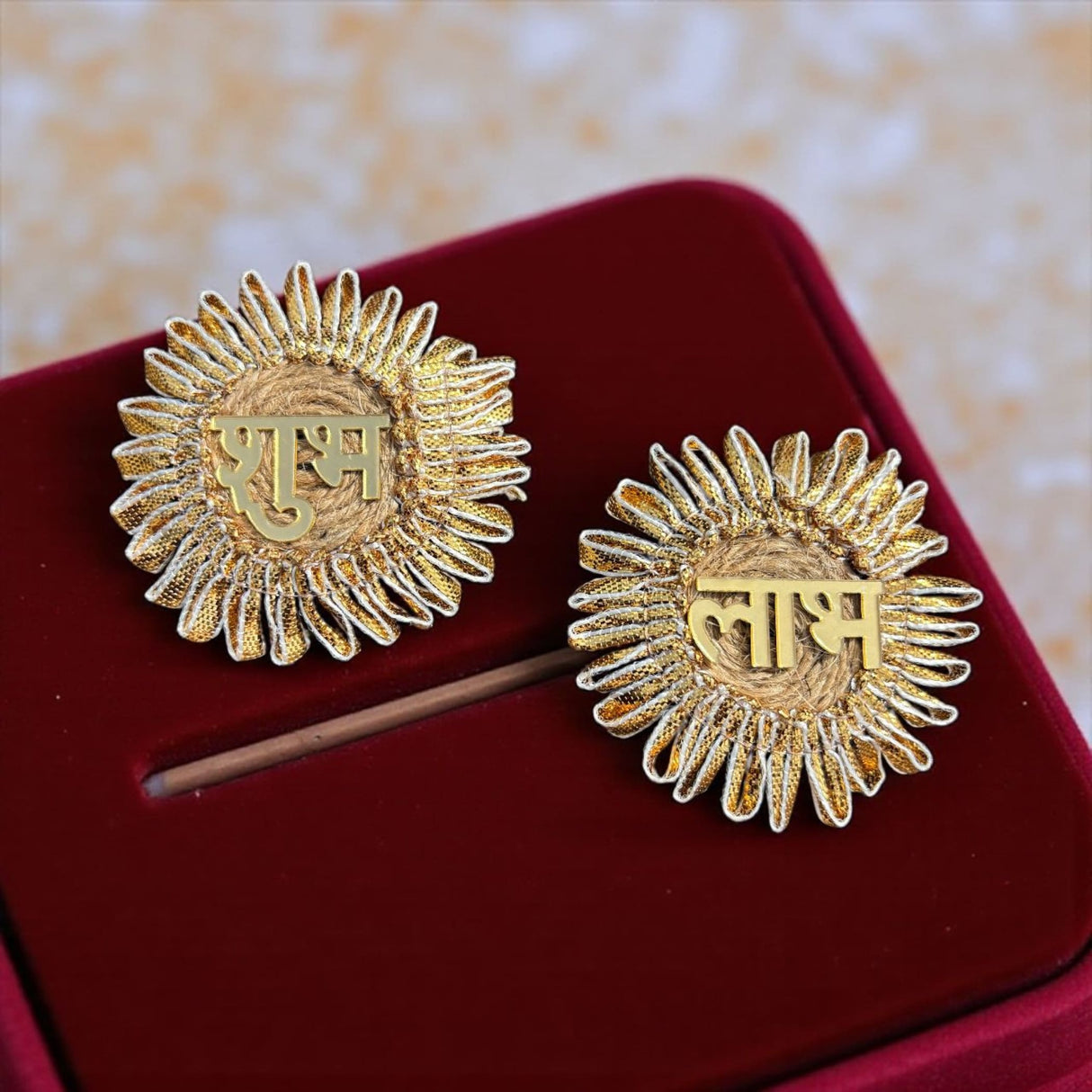 Pair of gold-colored round decorative items with ruffled edges for Indian home decor