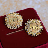 Pair of gold-colored round decorative items with ruffled edges for Indian home decor