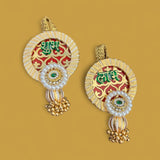 Ornate gold and red Shubh Labh hanging decor with pearls, emerald-like stone, and beads