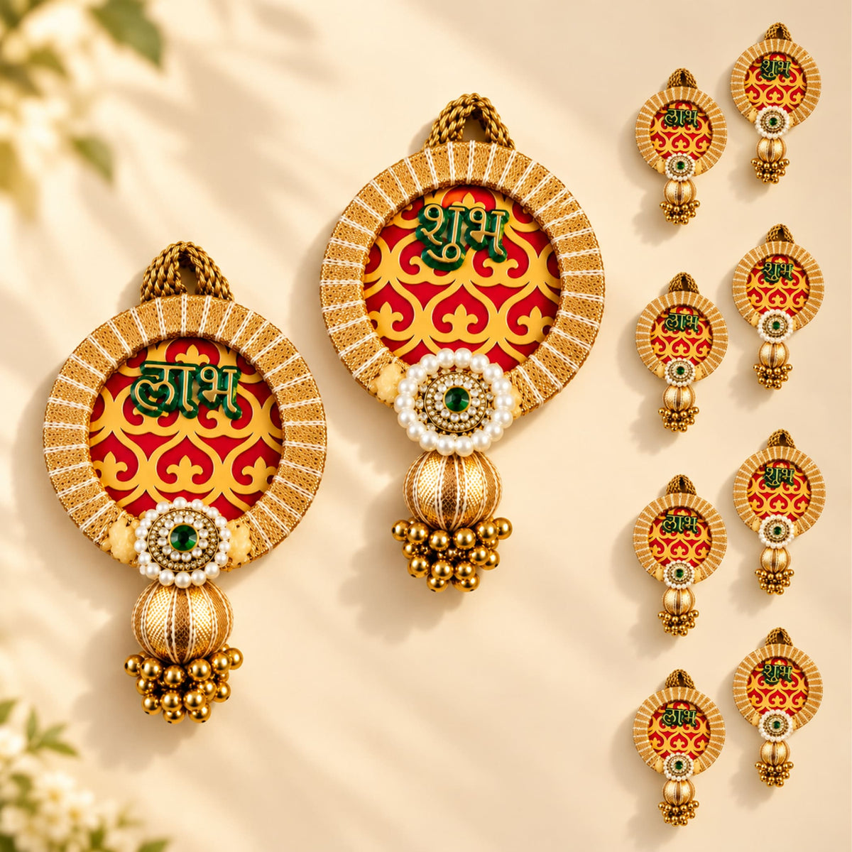 Gold-toned shubh labh hanging decor with red yellow patterns green devanagari script and pearl bead clusters for diwali and home decor