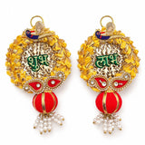 Golden ornamental door hangings with yellow floral wreaths green hindi शुभ लाभ script and jeweled peacock motifs for diwali decor
