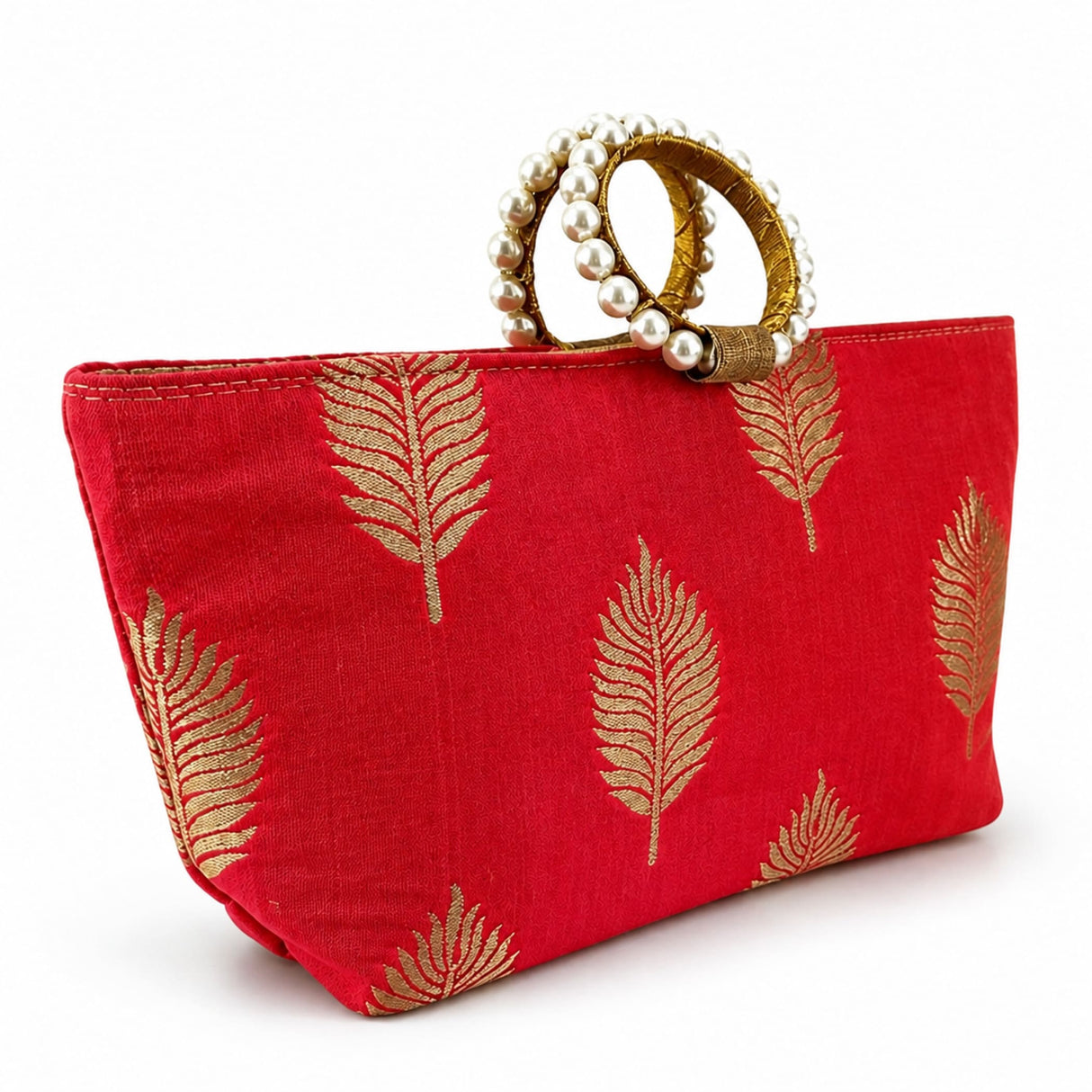 Red silk clutch bag with gold leaf embroidery and pearl-adorned golden handles for Eid and Diwali gifts