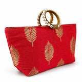 Red silk clutch bag with gold leaf embroidery and pearl-adorned golden handles for Eid and Diwali gifts