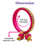 Vibrant fuchsia silk thread bangle with gold-tone kundan embellishments and dangling tassels for Indian wedding