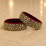 Elegant maroon velvet indian silk thread bangles adorned with gold-toned metalwork and sparkling kundan stones